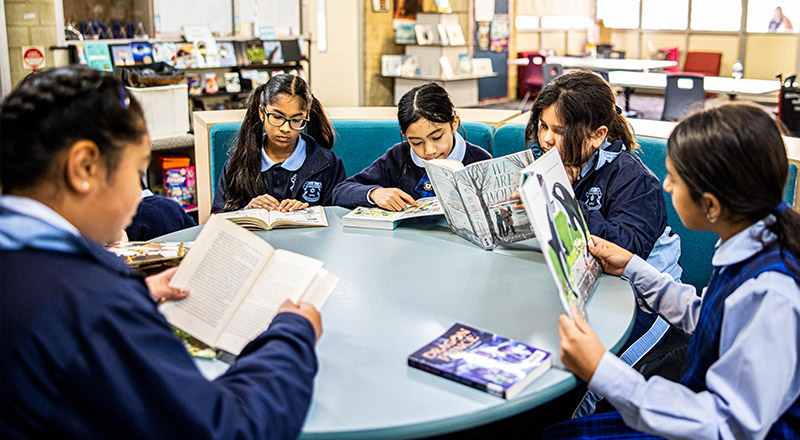 Students reading in the St Patrick's Catholic Primary Blacktown school library
