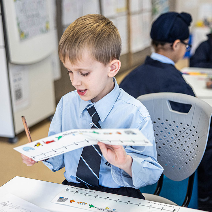Boy learning at St Patrick's Catholic Primary Blacktown